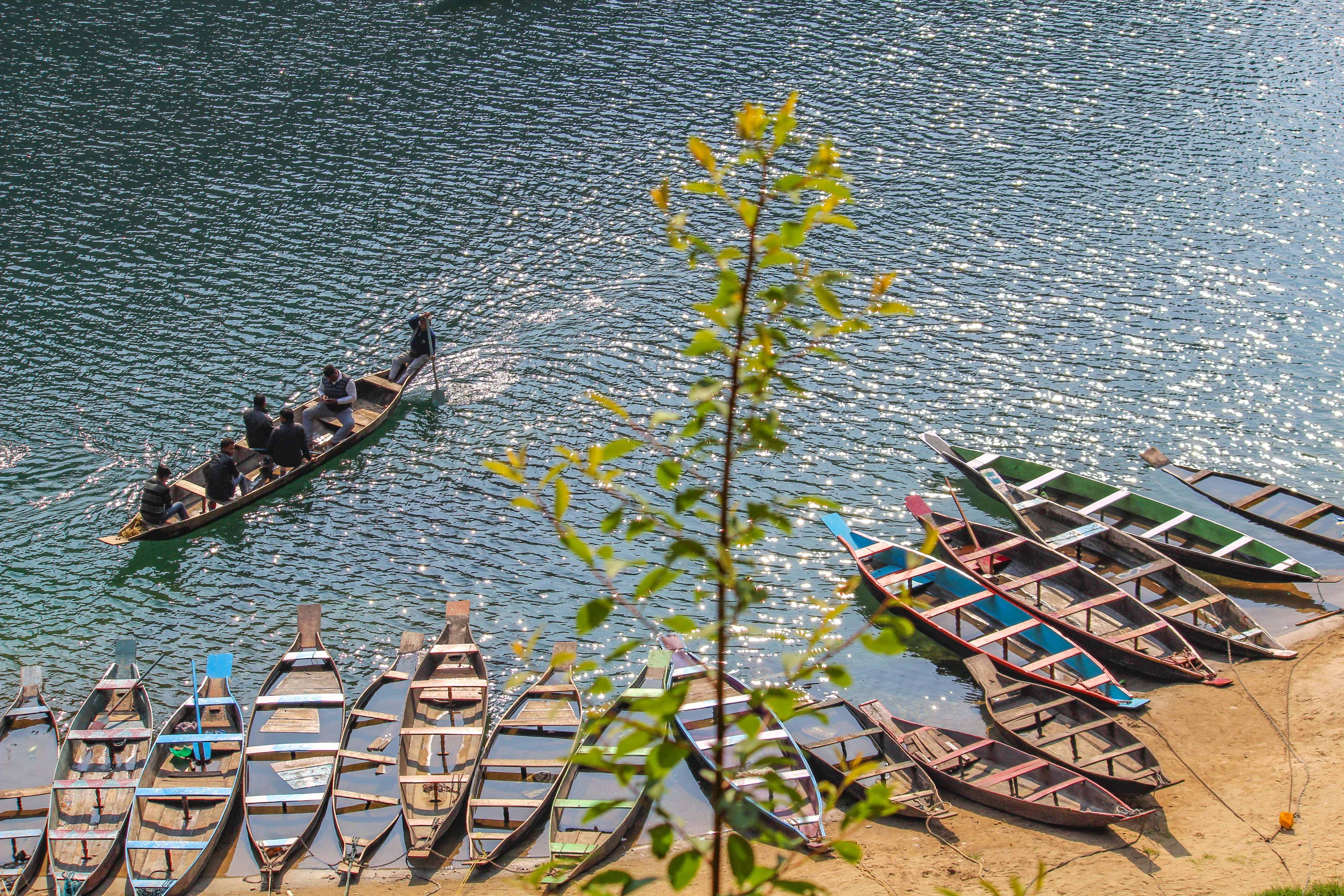 Boats docked at Dawki river in Meghalaya